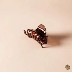 Caimán en carey ecológico en Colombia con diseño de bandas modernas, accesorio de lujo disponible en Bogotá, Cali, Ibagué, Medellín, Manizales, Popayán, Villavicencio, Pitalito, Barranquilla, Cartagena y Bucaramanga.
