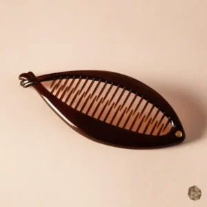 Mojarra en carey ecológico en Colombia con diseño de bandas modernas, accesorio de lujo disponible en Bogotá, Cali, Ibagué, Medellín, Manizales, Popayán, Villavicencio, Pitalito, Barranquilla, Cartagena y Bucaramanga.