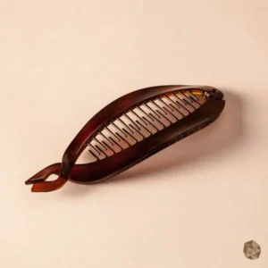 Mojarra en carey ecológico en Colombia con diseño de bandas modernas, accesorio de lujo disponible en Bogotá, Cali, Ibagué, Medellín, Manizales, Popayán, Villavicencio, Pitalito, Barranquilla, Cartagena y Bucaramanga.